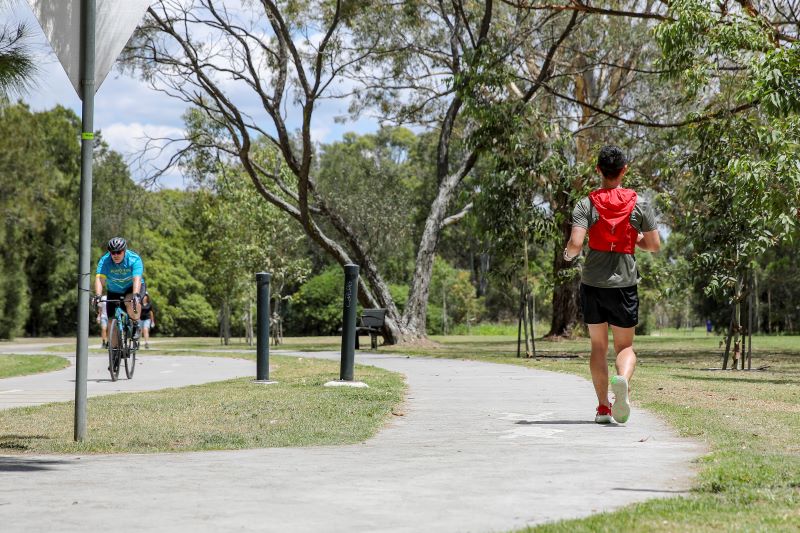 Man running on footpath