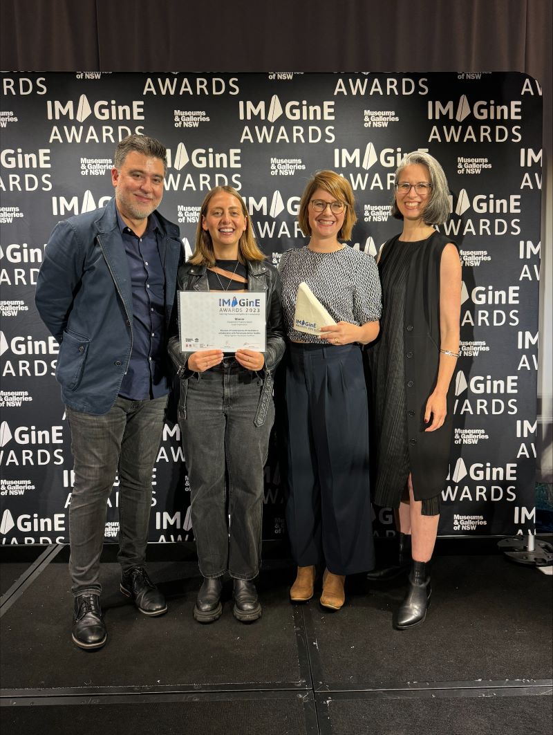 Man and Women receiving the awards